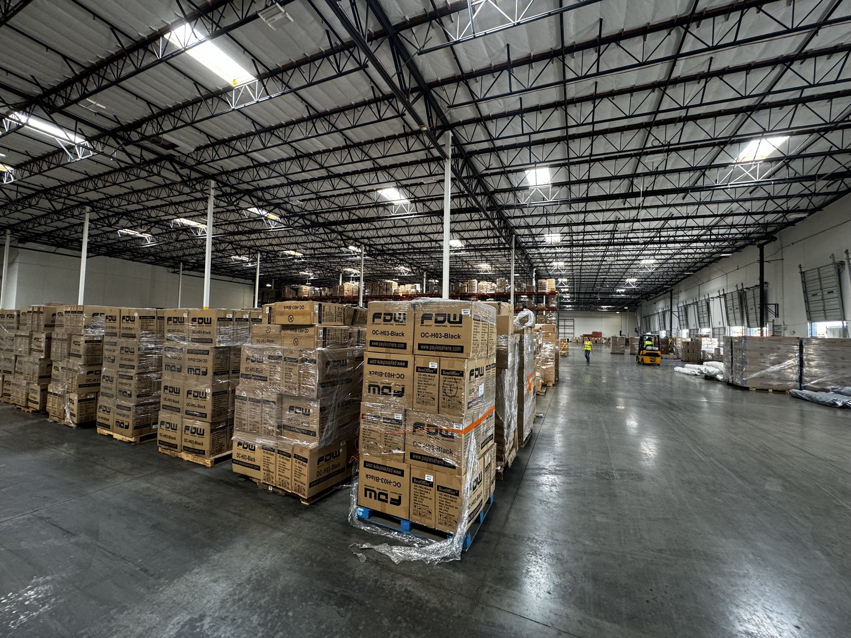 Returned packages being inspected at the warehouse
