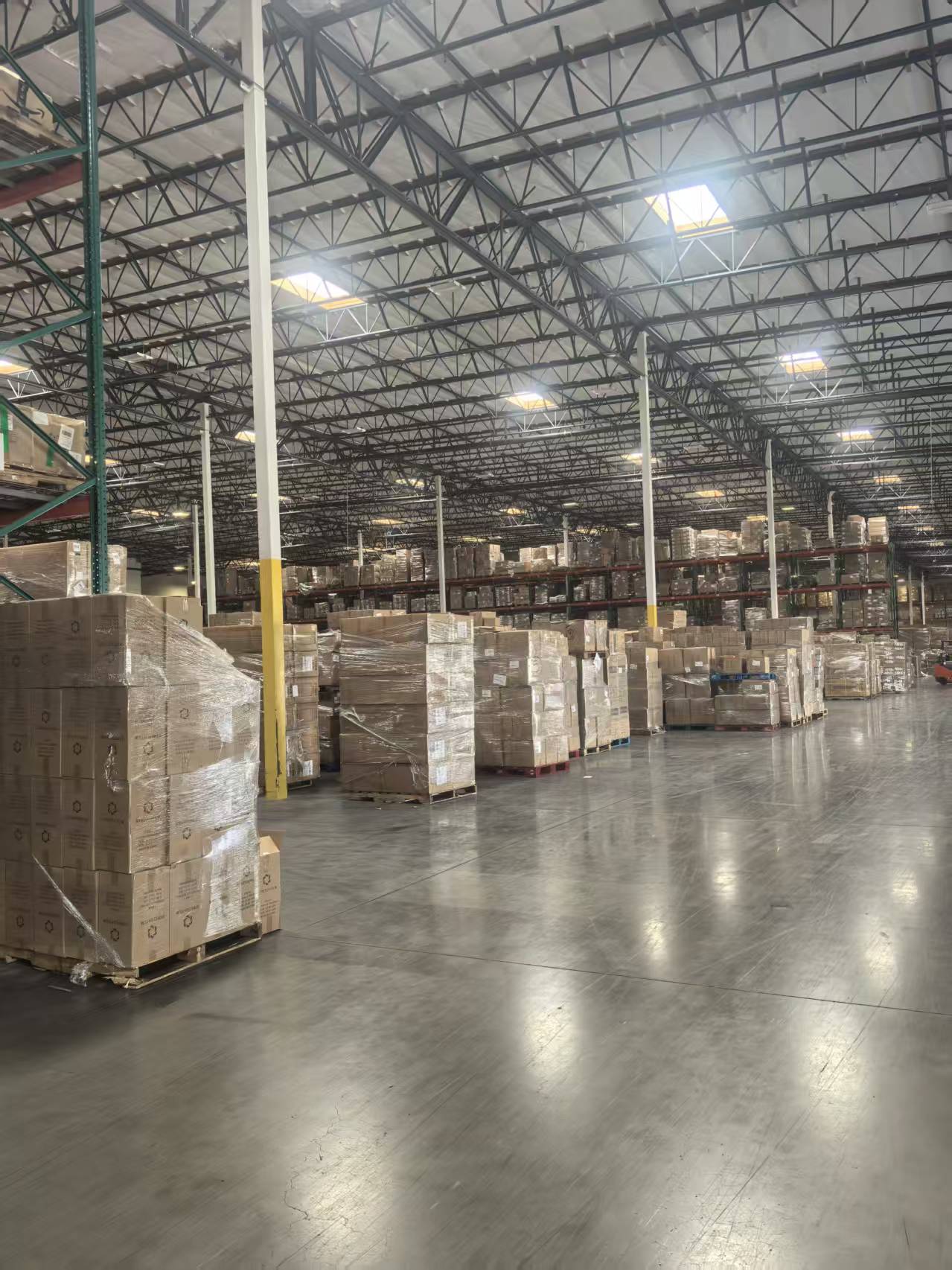 Workers inside a one-stop supply chain warehouse